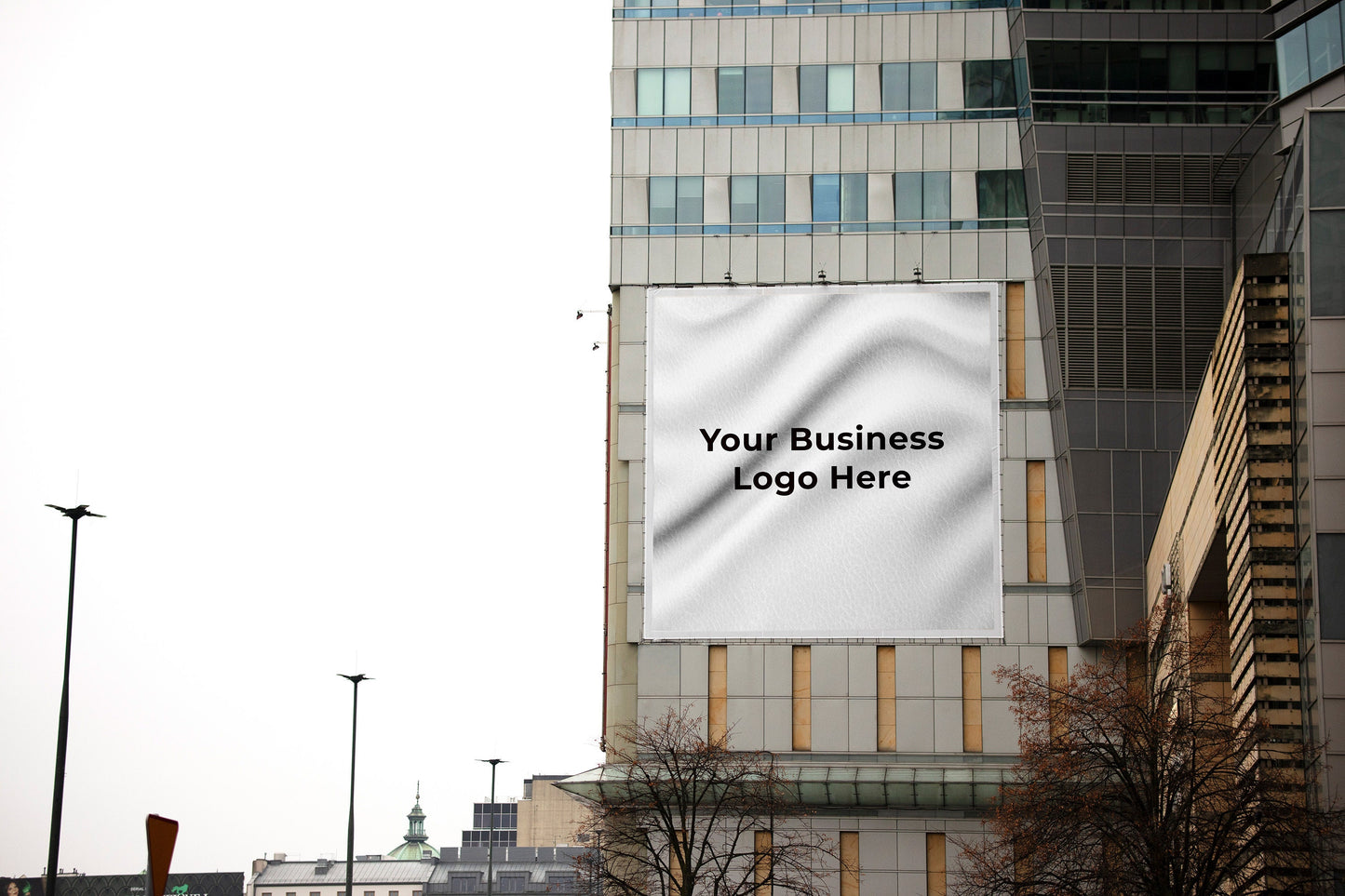 a tall building with a sign on the side of it